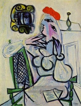  sitzen - Frau Sitzen au chapeau rouge 1934 kubist Pablo Picasso